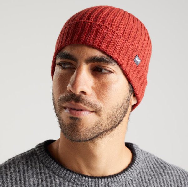 Man wearing red beanie hat