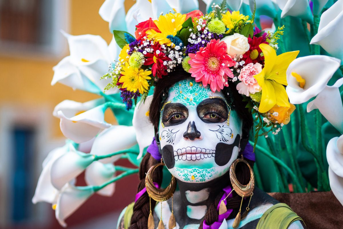 Woman with Day of the Dead costume and skull make-up
