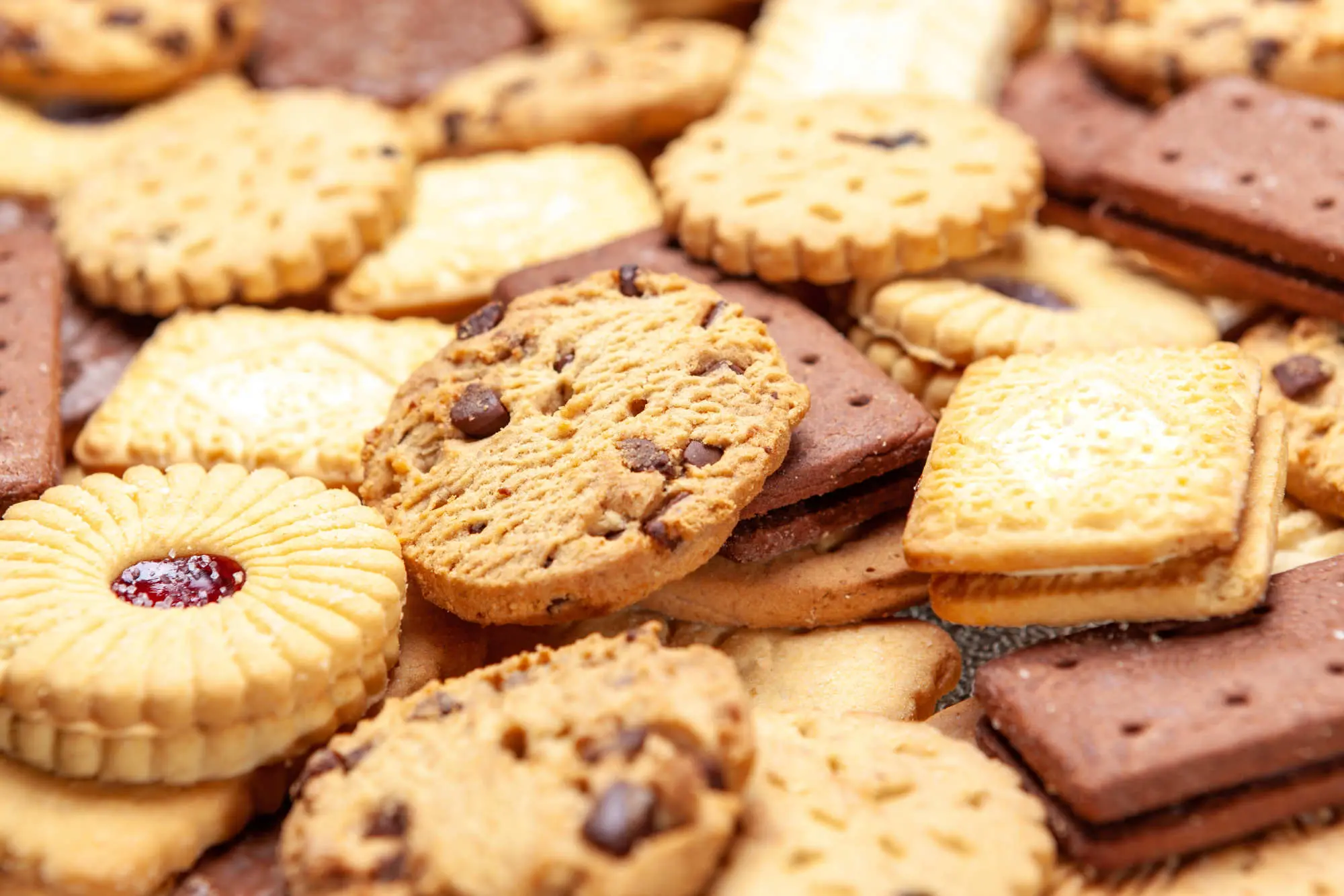 Assorted selection of tea biscuits and chocolate chip cookies