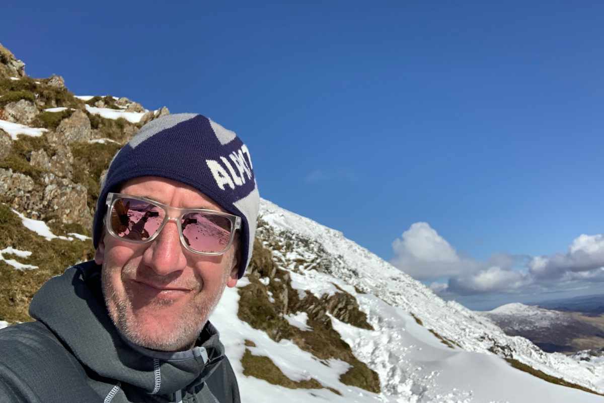 Simon Lightowler out hiking for YHA walks maps