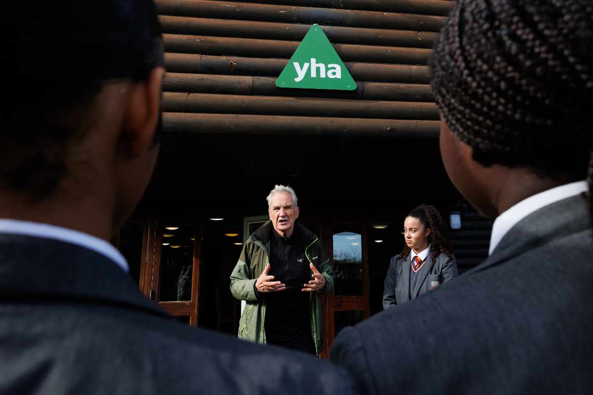 Larry Lamb talking to a school group at YHA London Lee Valley