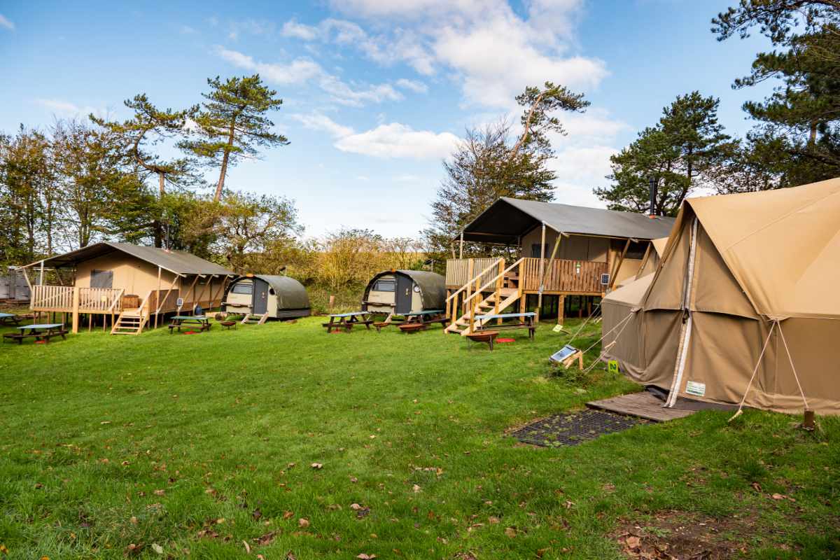 Safari tents and landpods in the grounds of YHA Truleigh Hill 
