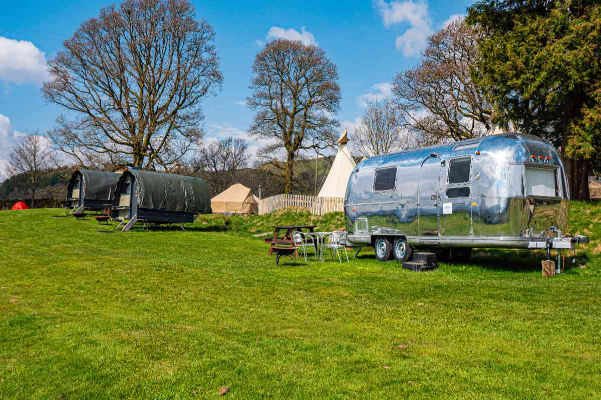 Airstream, landpods, bell tent and tipi in the grounds at YHA Windermere